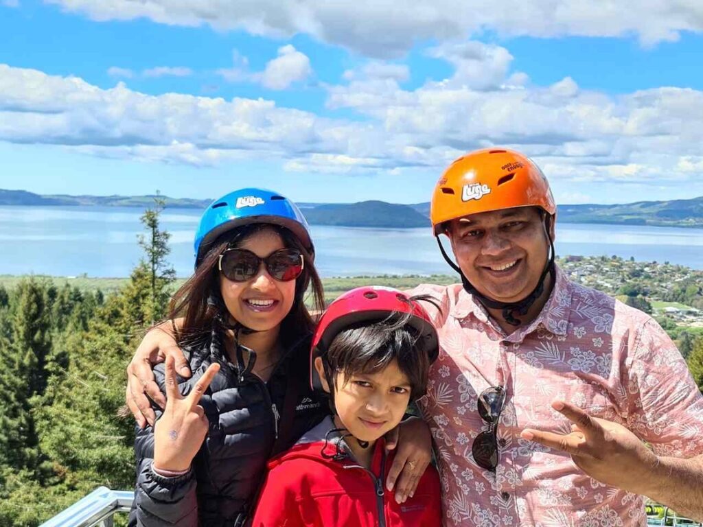 Nita with her family, sharing a joyful moment together in a adventurous setting.