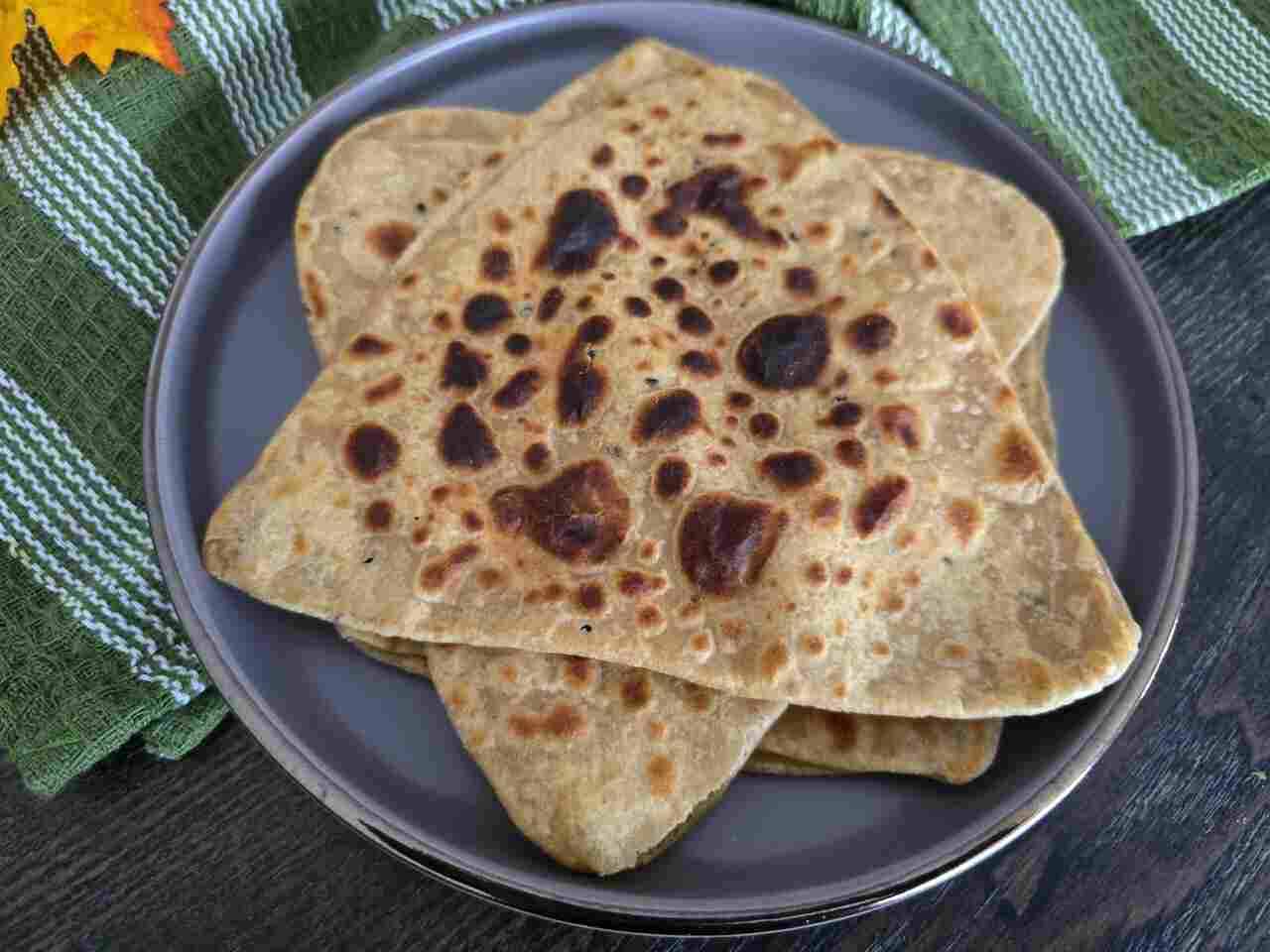 Homemade Paratha – Soft, flaky Indian flatbread served warm.