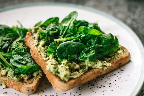 Bread with salads ad dressing presented as vegan recipe